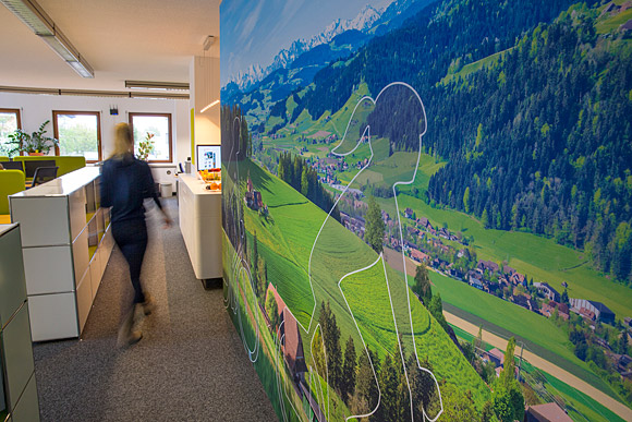 Gigapixel image of a hilly landscape as wall photo in travel agency.