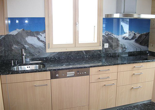 Glass kitchen mirror with panoramic picture of the Great Aletsch Glacier